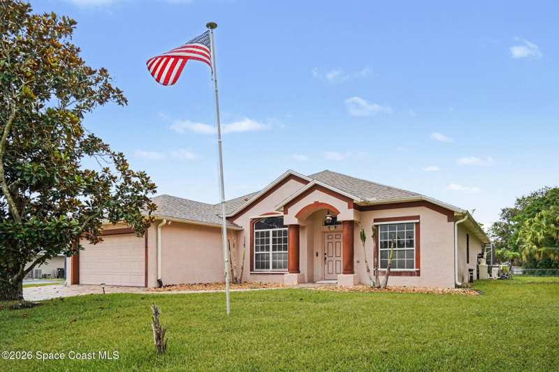 4 bedroom Single Family Residence at 974 Pebble Avenue, Port Malabar Unit 45, Palm Bay — photo 1