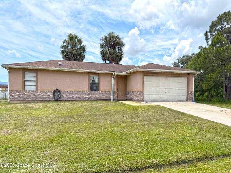 3 bedroom Single Family Residence at 1470 SE Toy Street, Port Malabar Unit 18, Palm Bay — photo 1