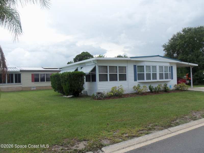 2 bedroom Manufactured Home at 346 Egret Circle, Barefoot Bay Unit 2 Part 11, Barefoot Bay — photo 1