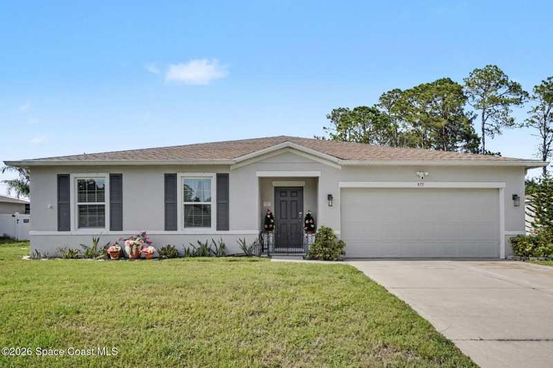 4 bedroom Single Family Residence at 975 Sablon Street, Port Malabar Unit 16, Palm Bay — photo 1