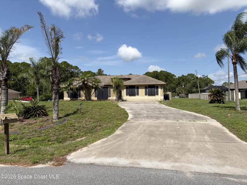 5 bedroom Single Family Residence at 3020 Forghun Avenue, Port Malabar Unit 25, Palm Bay — photo 1