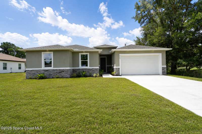 4 bedroom Single Family Residence at 360 Warwick Street, Port Malabar Unit 25, Palm Bay — photo 1