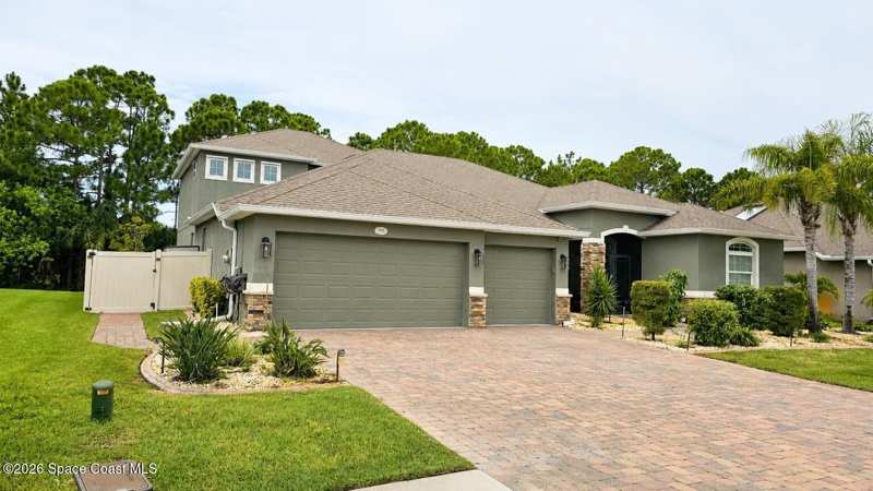 5 bedroom Single Family Residence at 539 Easton Forest Circle, Stonebriar at Bayside Lakes, Palm Bay — photo 1