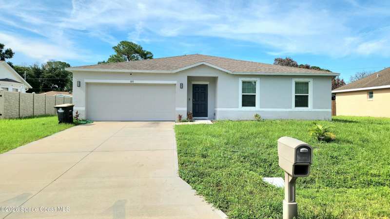 4 bedroom Single Family Residence at 1051 Pope Street, Port Malabar Unit 42, Palm Bay — photo 1