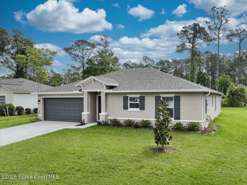 4 bedroom Single Family Residence at 419 Carpenter Avenue #14, Port Malabar Unit 14, Palm Bay — photo 1