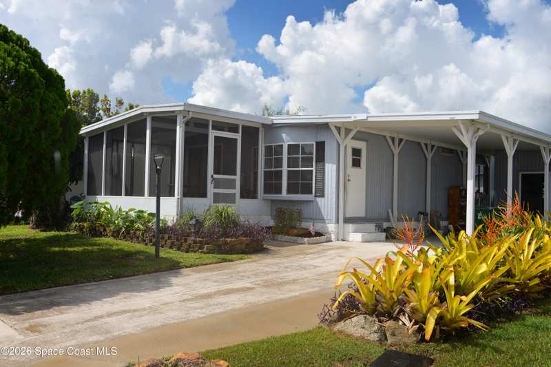 2 bedroom Manufactured Home at 1023 Oriole Circle, Barefoot Bay Unit 2 Part 10, Barefoot Bay — photo 1