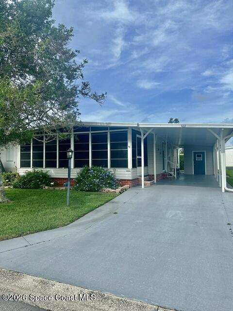 2 bedroom Manufactured Home at 922 Thrush Circle, Barefoot Bay Unit 2 Part 11, Barefoot Bay — photo 1
