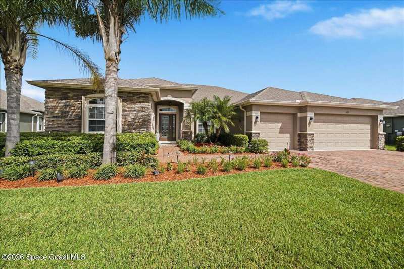 4 bedroom Single Family Residence at 655 Gleneagles Drive, Stonebriar at Bayside Lakes, Palm Bay — photo 1
