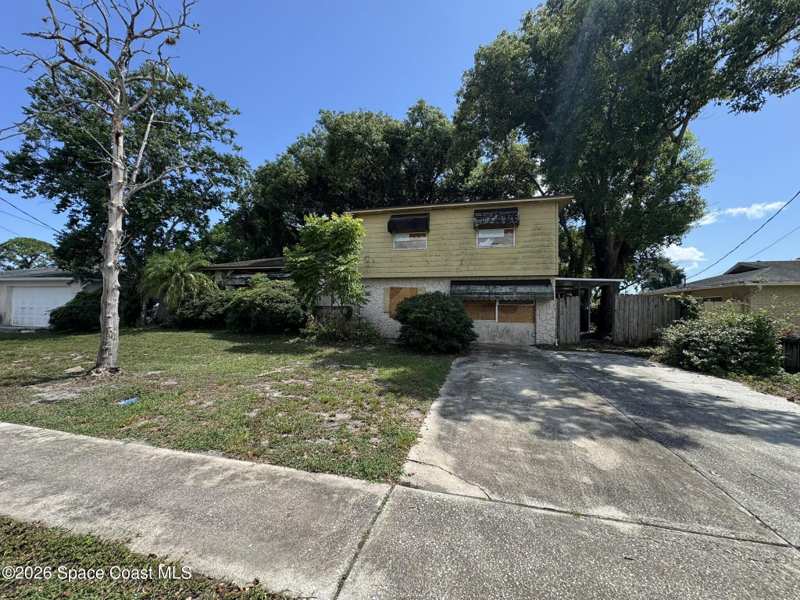 4 bedroom Single Family Residence at 999 Sycamore Drive, Woodsmere Sec 2 Block 8, Rockledge — photo 1