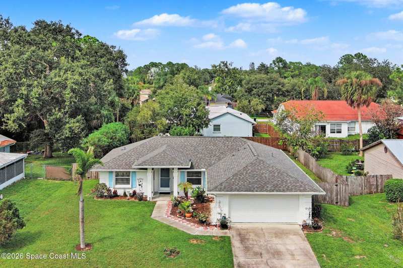 3 bedroom Single Family Residence at 353 NW Rheine Road, Port Malabar Unit 48, Palm Bay — photo 1