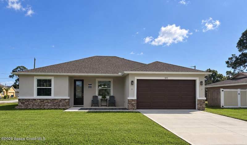 4 bedroom Single Family Residence at 571 Charlotta Avenue, Port Malabar Unit 9, Palm Bay — photo 1