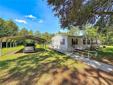 2670 SE 141St Avenue, home for sale in Morriston 32668