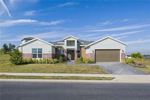 208 Snowy Orchid Way, home for sale in Lake Alfred 33850