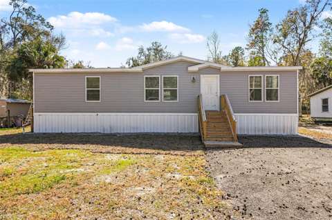 23950 Bass Road, home for sale in Astor 32102