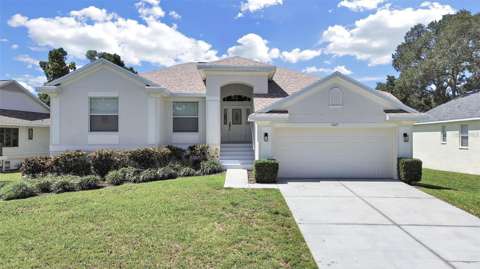 1025 Lake Avoca Place, $300k–$500k for sale in Tarpon Springs