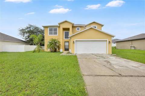 196 Athabasca Drive, $300k–$500k for sale in Poinciana
