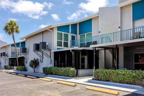 159 Medallion Boulevard #F, home for sale in Madeira Beach 33708
