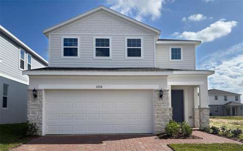 6708 Spotted Eagle Loop, $300k–$500k for sale in Howey In The Hills