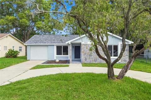 7033 Wentworth Way, $300k–$500k for sale in New Port Richey