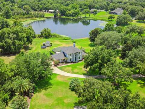 7648 Lake Angelina Drive, waterfront for sale in Mount Dora