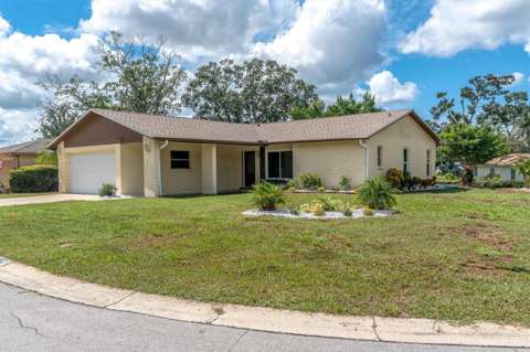 10531 Meadow Hill Drive, $300k–$500k for sale in Port Richey