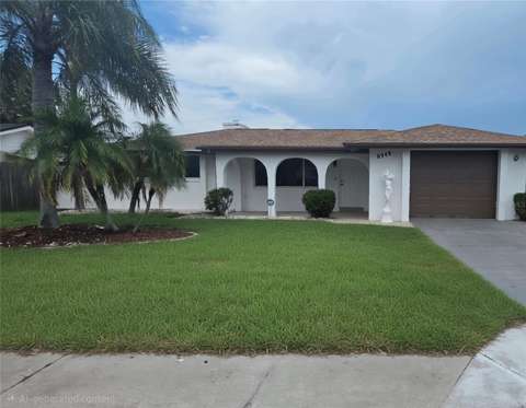 8948 Saint Regis Lane, $300k–$500k for sale in Port Richey