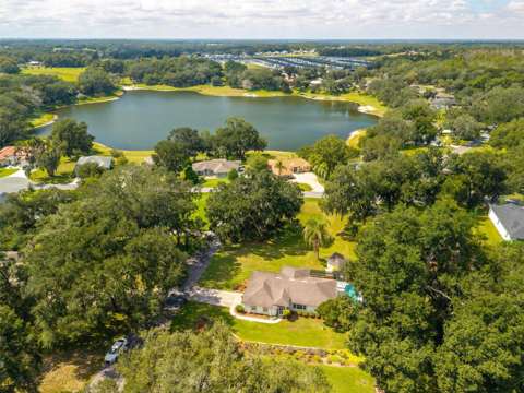 211 Hanging Moss Lane, $300k–$500k for sale in Lady Lake