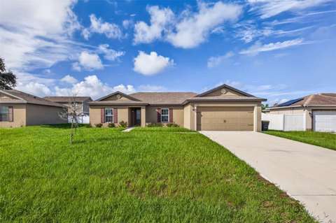 334 Begonia Court, $300k–$500k for sale in Poinciana
