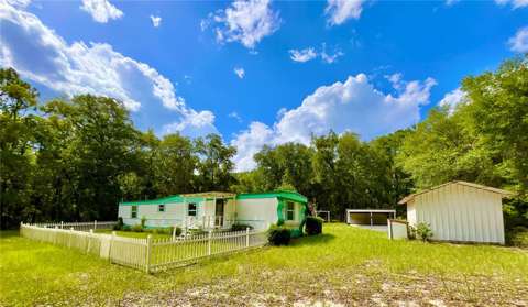 8232 Swan Lake Road, home for sale in Melrose 32666