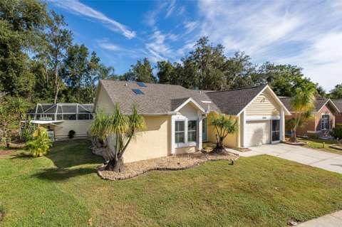 10305 Copperwood Drive, $300k–$500k for sale in New Port Richey