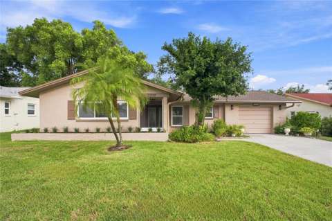 2336 Malcolm Drive, $300k–$500k for sale in Palm Harbor