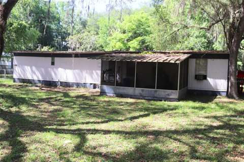 2466 Cr 401A, home for sale in Lake Panasoffkee 33538
