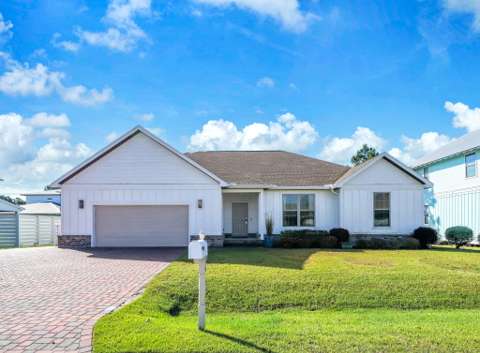126 Tropical Breeze Drive, home for sale in Santa Rosa Beach 32459