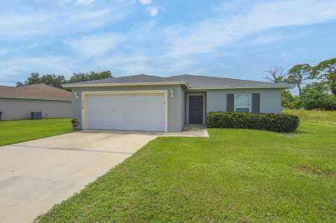 718 NE Perch Lane, home for sale in Port St. Lucie 34983