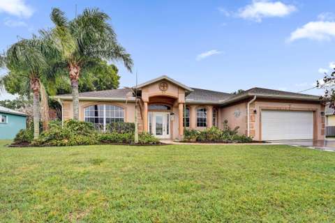 5825 NW Zenith Drive, $300k–$500k for sale in Port St. Lucie