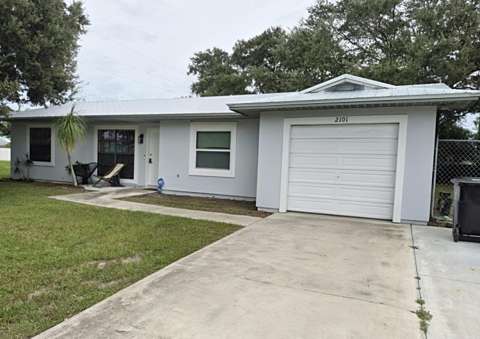 2101 SW Idaho Lane, home for sale in Port St. Lucie 34953