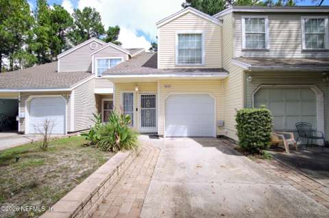 9806 Moorings Drive, home for sale on Moorings Drive
