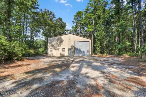 1403 NE Captains Cove Road, home for sale in Townsend 31331