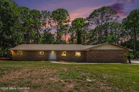 8001 Pine Needle Lane, home for sale in West Melbourne 32904