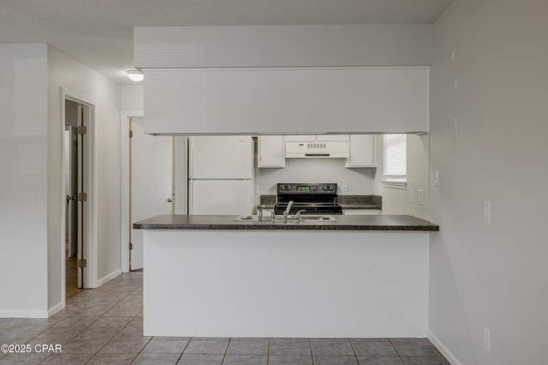 2 bedroom Condominium at 7813 N Lagoon Drive 4H, Greenwood Estates 5, Panama City Beach — photo 4