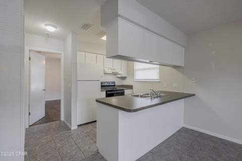 7813 N Lagoon Drive 4H, Panama City Beach FL - photo 8 of 45