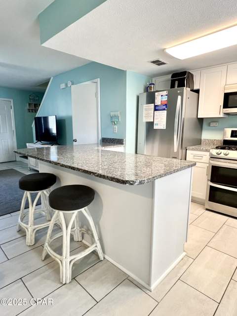 206 Robin Lane, Panama City Beach FL - photo 7 of 59