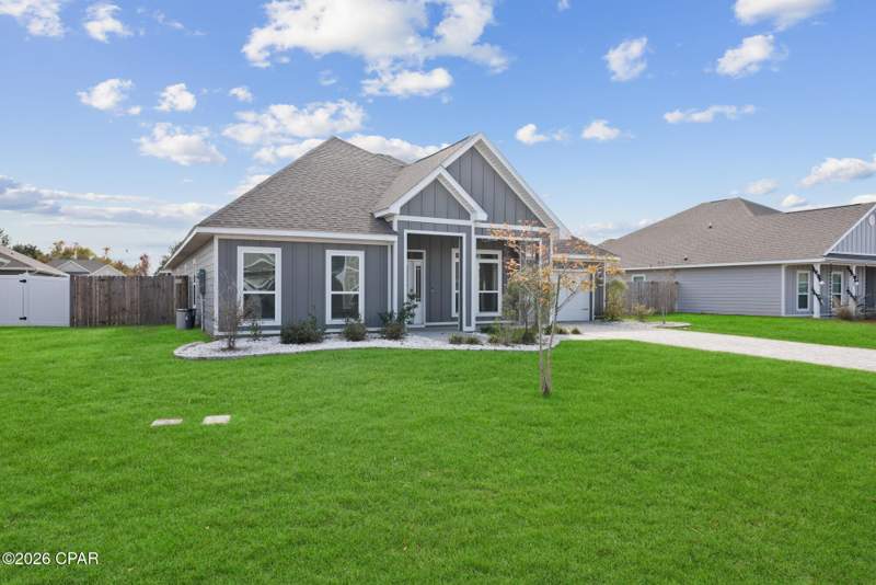 5 bedroom SingleFamilyResidence at 140 Martingale Loop, Plantation at College Point, Lynn Haven — photo 2