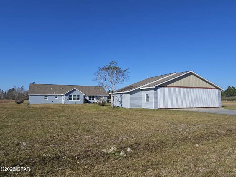 3 bedroom SingleFamilyResidence at 13322 Airway Street, Sandy Creek Air Park, Panama City — photo 4