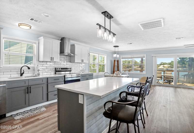 5 bedroom MultiFamily at 6722 S Lagoon Drive, Holiday Beach Unit 1, Panama City — photo 2
