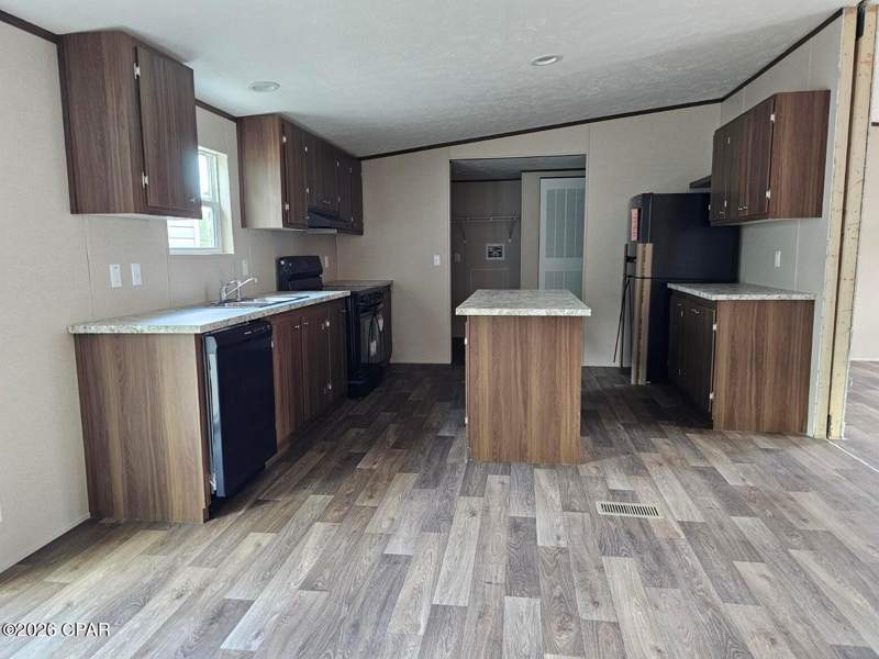 4 bedroom ManufacturedHome at Tbd Beaverhead Street, Compass Lake Hills Unit 5, Alford — photo 4