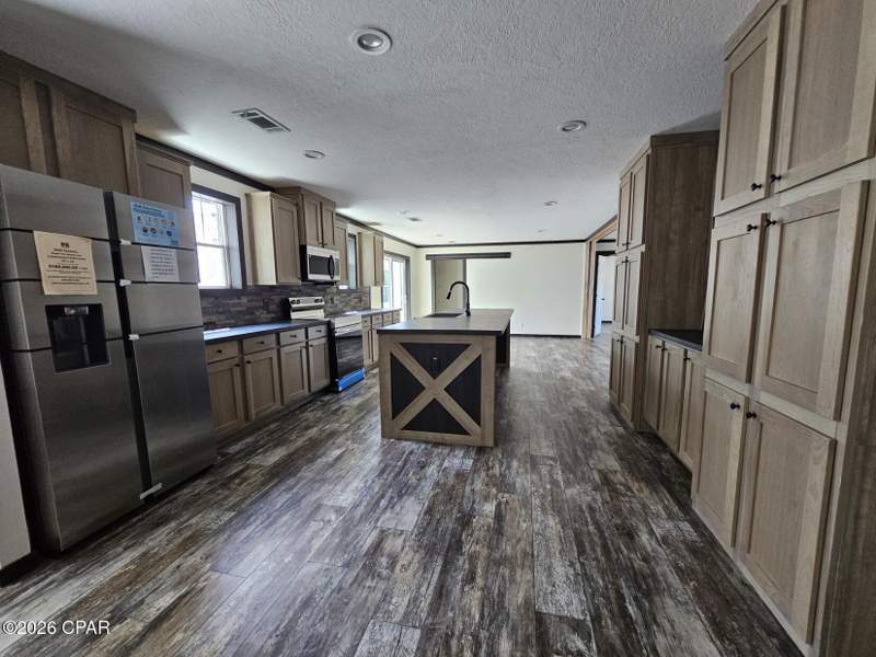 4 bedroom ManufacturedHome at Tbd Deer Run Circle, Compass Lake Hills Unit 5, Alford — photo 3