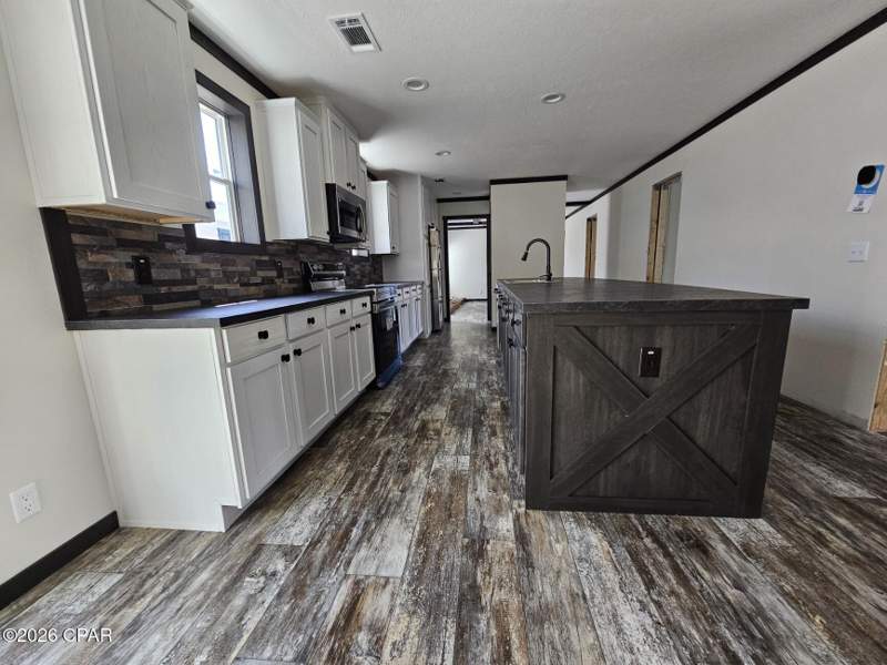 4 bedroom ManufacturedHome at Tbd Davis Court, Compass Lake Hills Unit 5, Alford — photo 3