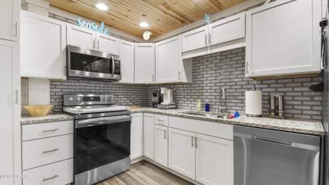 7013 S Lagoon Drive, Panama City Beach FL - photo 15 of 57