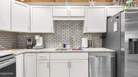 7013 S Lagoon Drive, Panama City Beach FL - photo 16 of 57